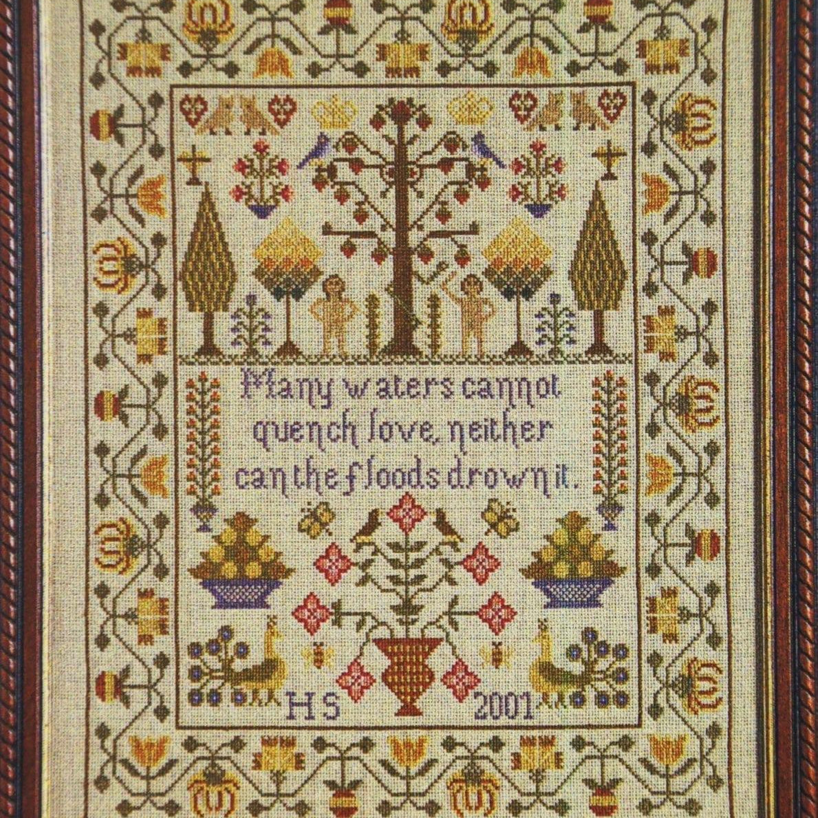 adam and eve sampler counted cross stitch design closeup