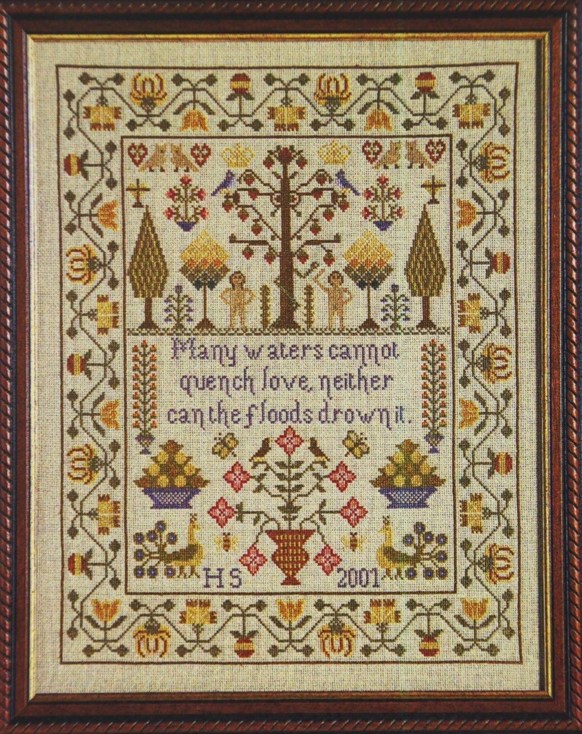 adam and eve sampler counted cross stitch design closeup