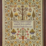 adam and eve sampler counted cross stitch design closeup