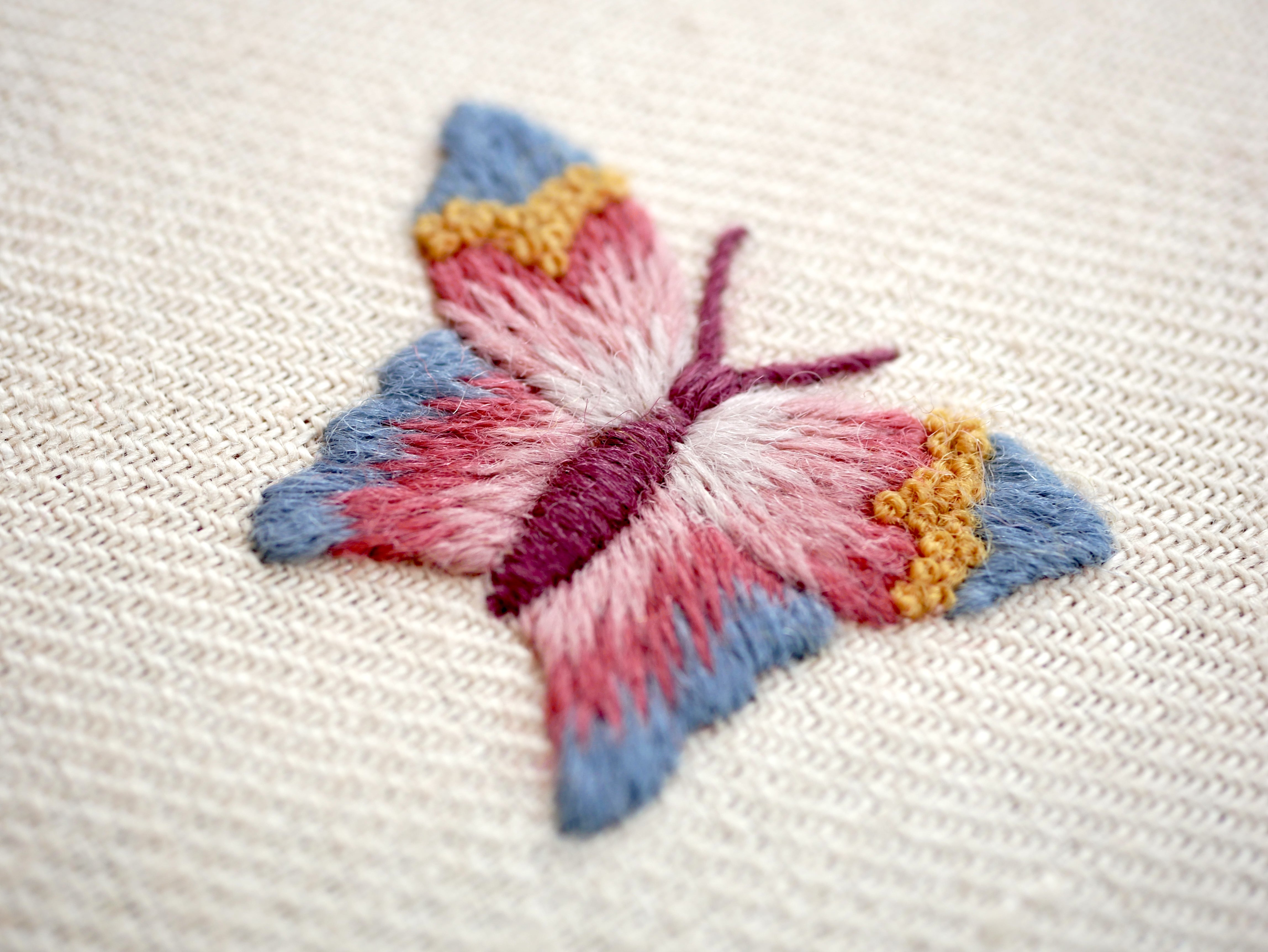 Crewelwork floral and butterfly embroidery designed and stitched by Kate Barlow using Appletons crewel wools on linen twill