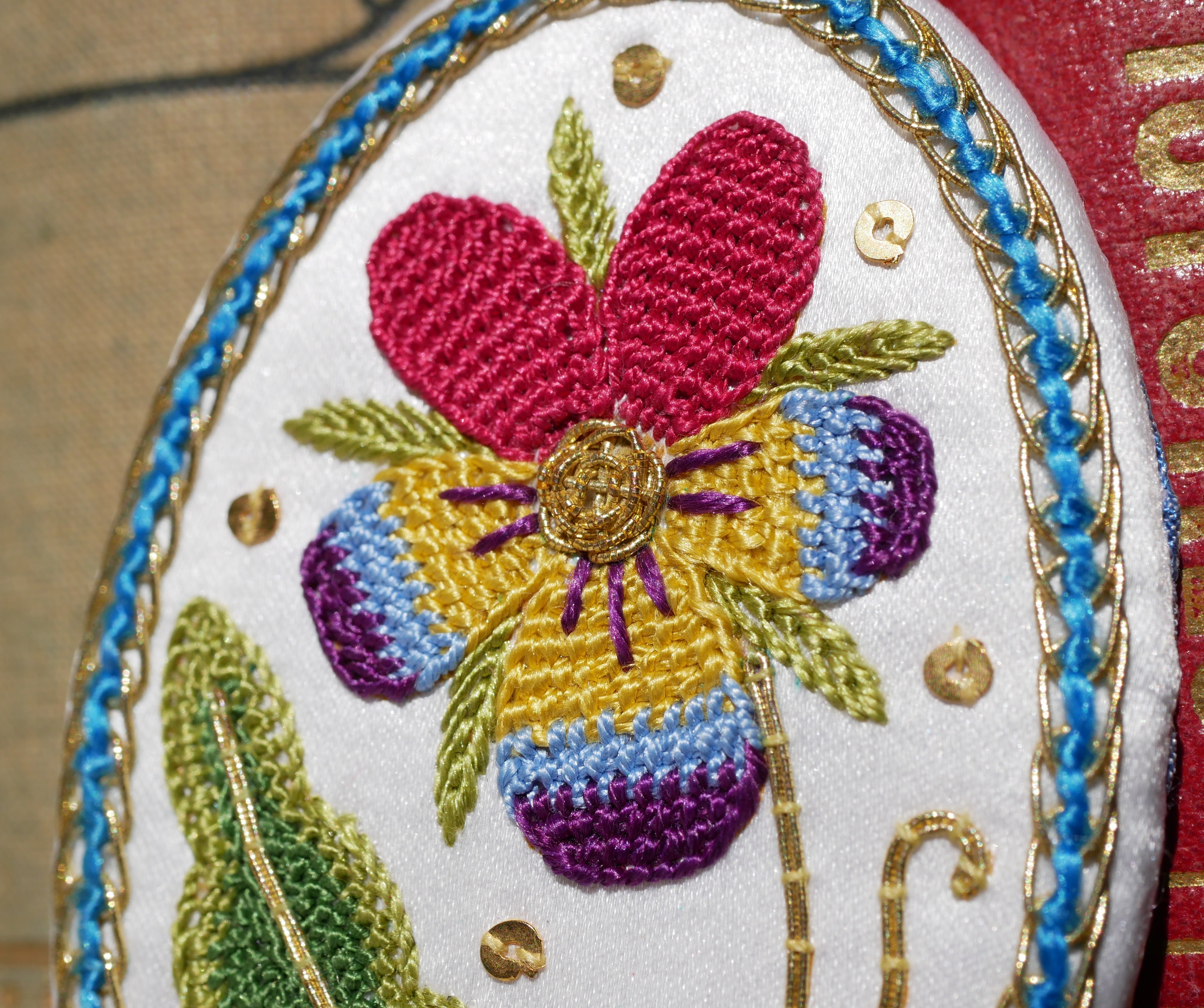 Elizabethan-inspired Pansy embroidery designed and stitched by Kate Barlow using silk threads, Goldwork and Needlelace techniques