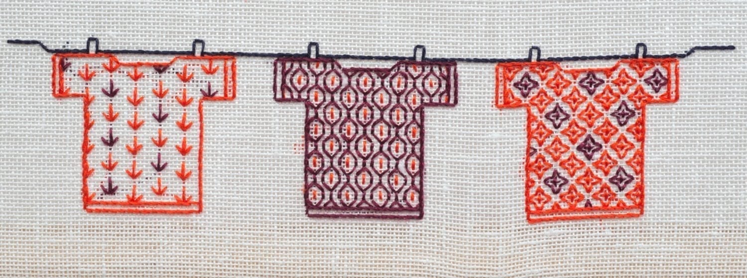 T-Shirts on a Washing Line by Claire De Waard