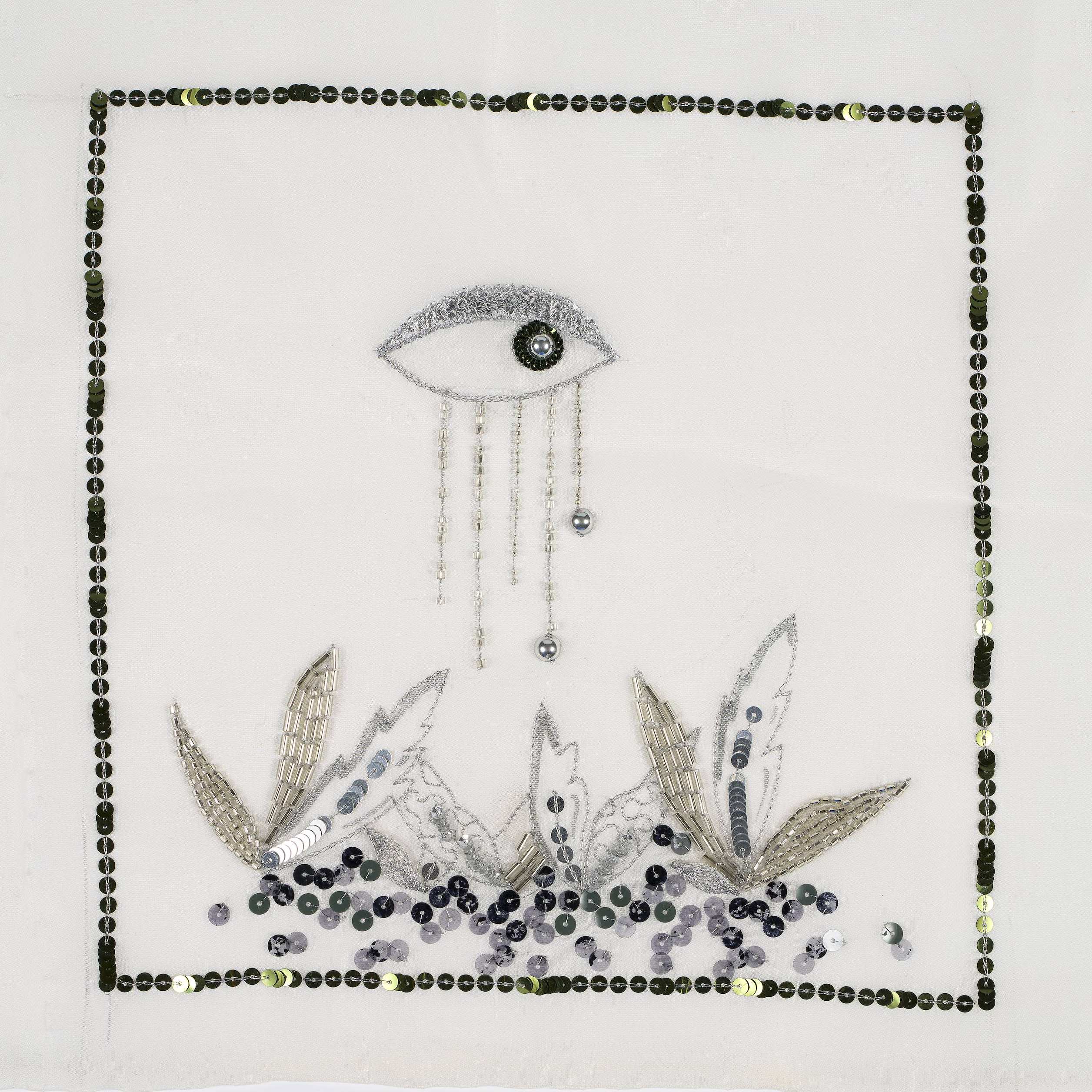 Tambour Beading eye design with sequin and bead embroidery, designed and stitched by Justine Bonenfant as a contemporary introduction to Couture Embroidery.