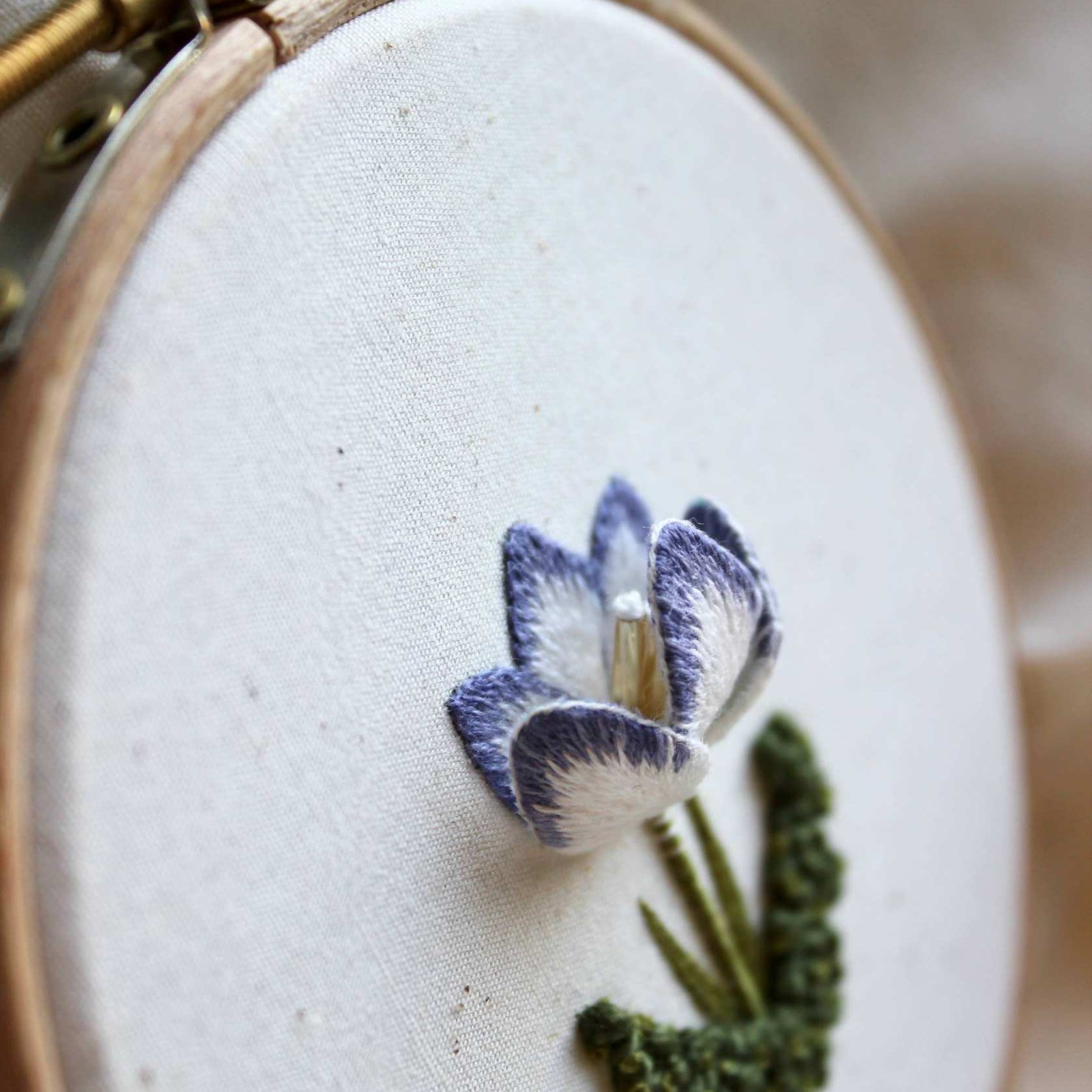 Embroidered Stumpwork crocus by Lemon Pepper Studio, stitched by Pippa Haynes, featuring three-dimensional petals and Silk Shading embroidery to create subtle colour variation.
